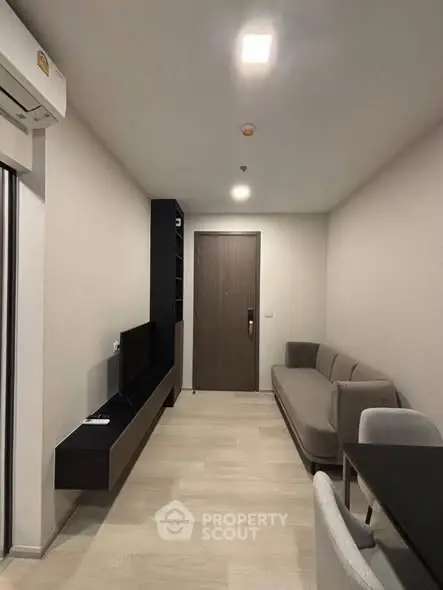 Modern living room with sleek furniture and minimalist design