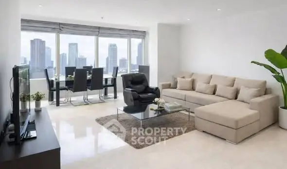 Spacious modern living room with city view and elegant dining area