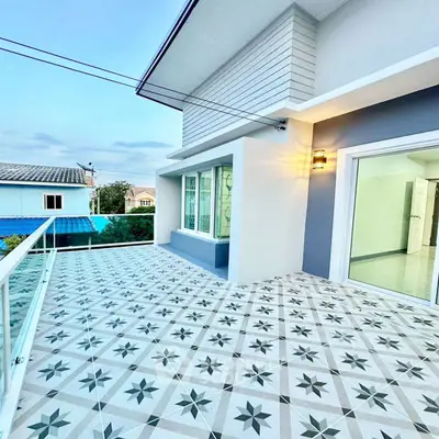 Stunning modern balcony with stylish tile flooring and elegant lighting