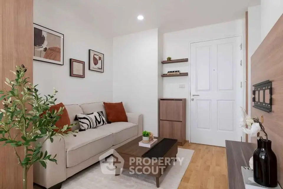 Modern living room with stylish decor and cozy seating area, perfect for relaxation.