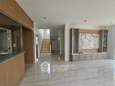 Spacious modern living room with elegant marble accents and open layout