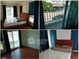 Spacious bedroom with balcony access in modern home