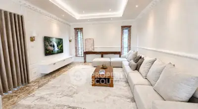 Luxurious living room with elegant decor and spacious seating area