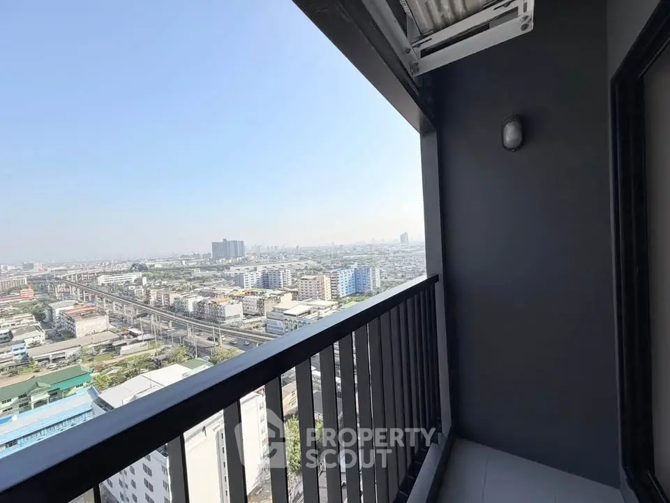 Stunning cityscape view from a modern high-rise balcony, perfect for urban living enthusiasts.