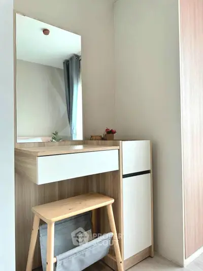 Modern bedroom corner with stylish vanity and stool