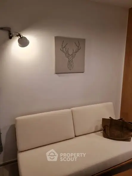 Cozy living room with modern decor and stylish wall art