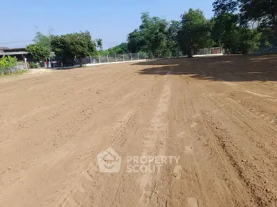 Expansive vacant land plot ideal for development in a serene neighborhood.