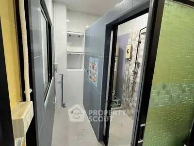 Modern bathroom with shower and sleek tile design