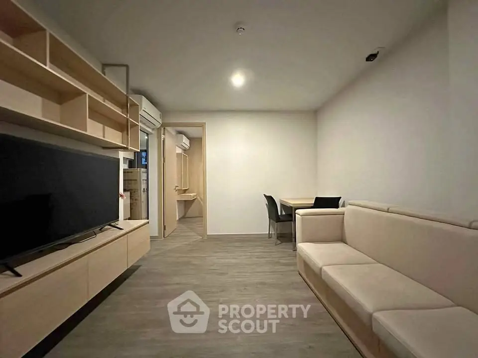Modern living room with sleek furniture and open layout, perfect for contemporary living.