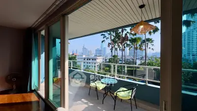 Charming balcony with city view, perfect for relaxation and enjoying the skyline.