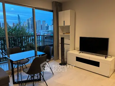 Modern living room with city view, stylish furniture, and large windows.