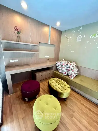 Charming living room with modern decor and cozy seating area