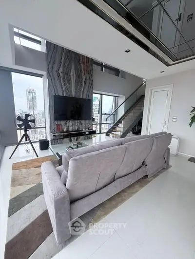 Luxurious modern living room with stunning city view and elegant decor
