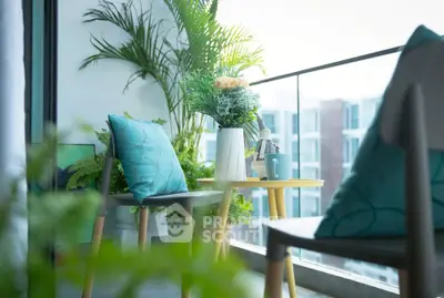 Charming balcony with modern furniture and lush greenery, perfect for relaxation and enjoying the view.