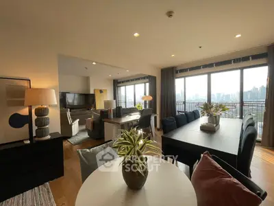 Spacious modern living room with city view and elegant decor