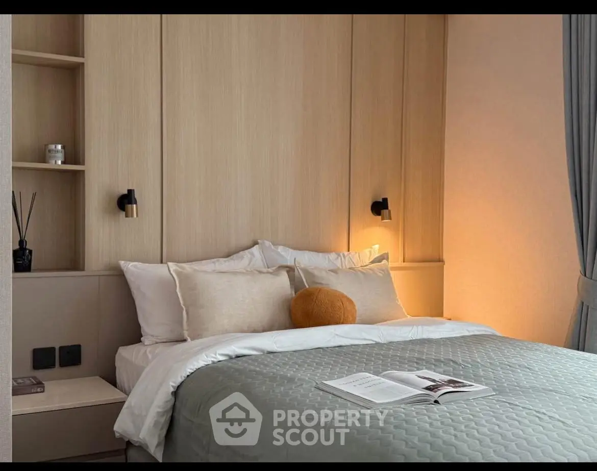 Cozy modern bedroom with elegant lighting and stylish decor