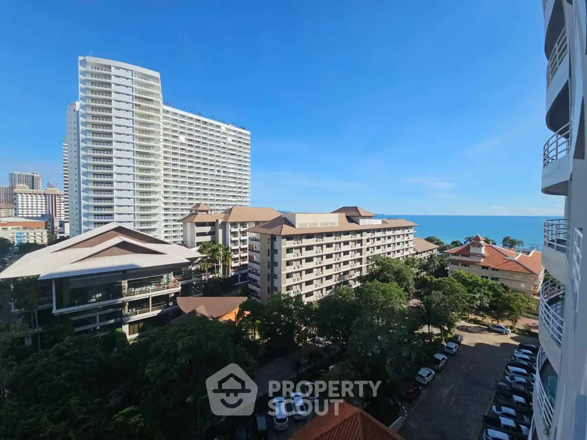 Stunning coastal view from high-rise building with ocean backdrop