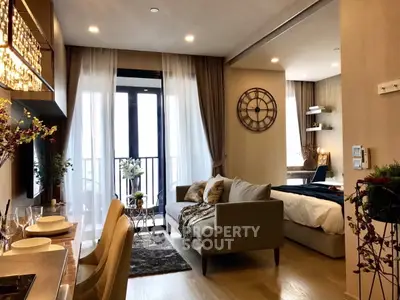 Luxurious open-plan living room with elegant decor and cozy seating area, perfect for modern urban living.