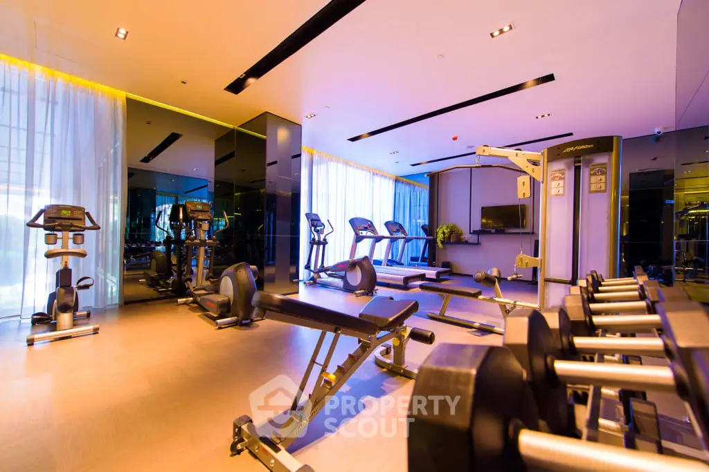 Luxurious modern gym with state-of-the-art equipment and ambient lighting