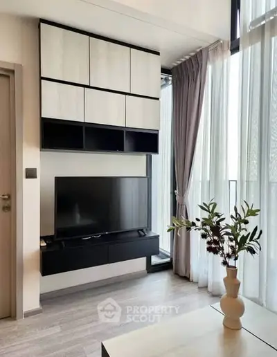 Modern living room with sleek TV setup and elegant decor