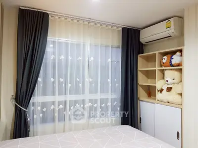 Cozy bedroom with plush toys and modern air conditioning