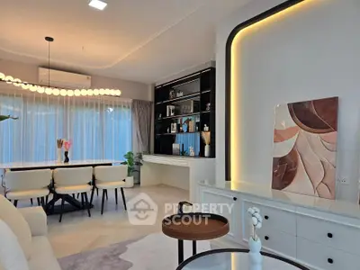 Modern living room with elegant dining area and stylish decor