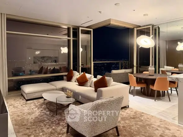 Luxurious modern living room with stunning night city view, elegant furniture, and ambient lighting.