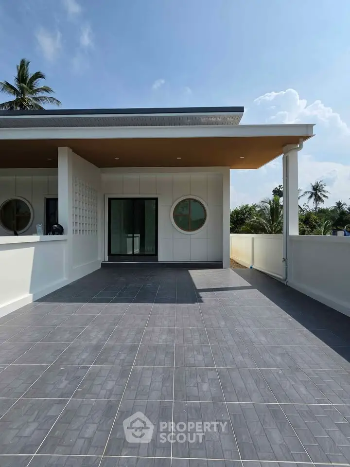 Modern rooftop terrace with sleek design and scenic views, perfect for relaxation and entertainment.