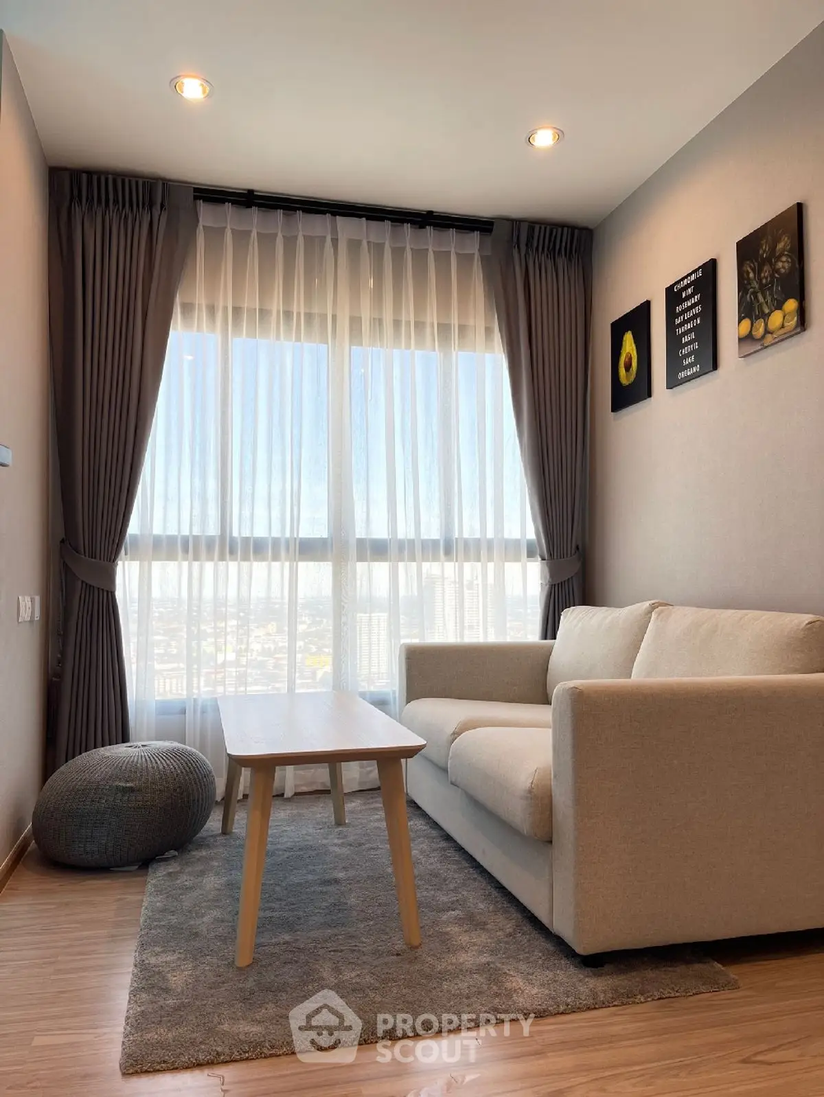 Cozy living room with modern decor and large window view