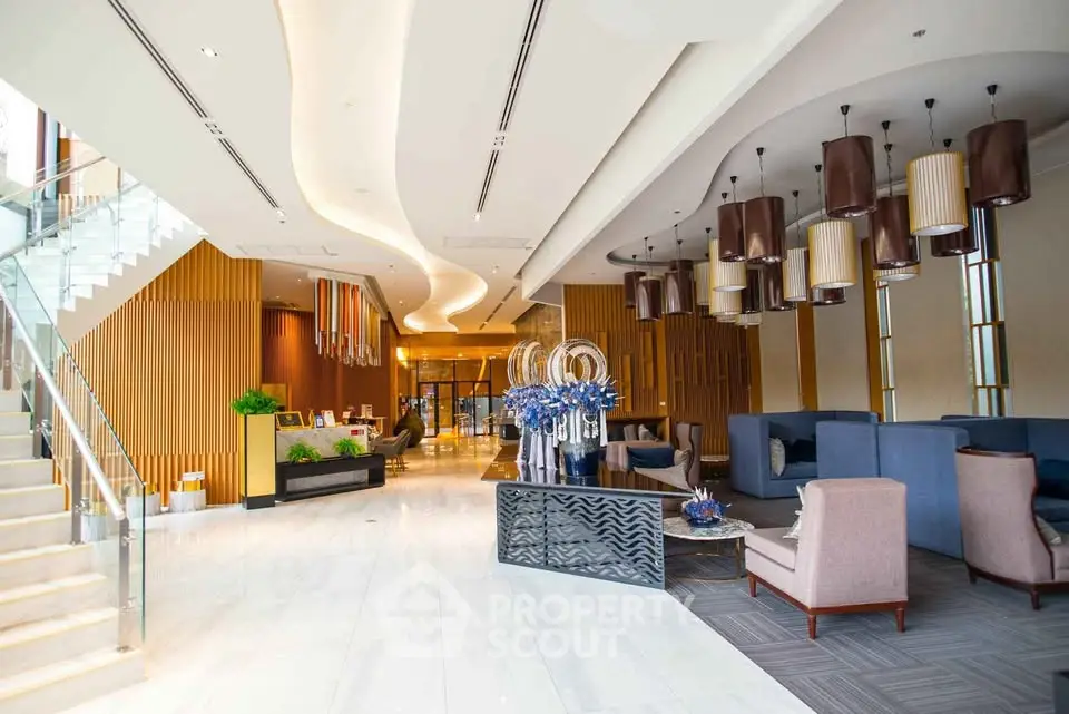 Luxurious hotel lobby with modern design and elegant seating area
