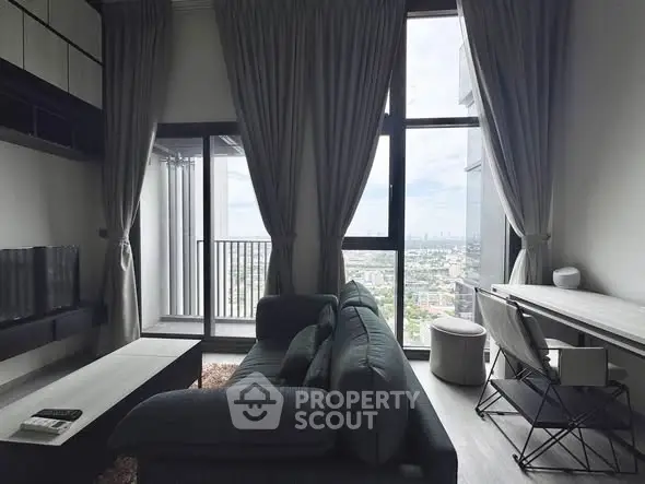 Modern living room with city view and stylish furniture