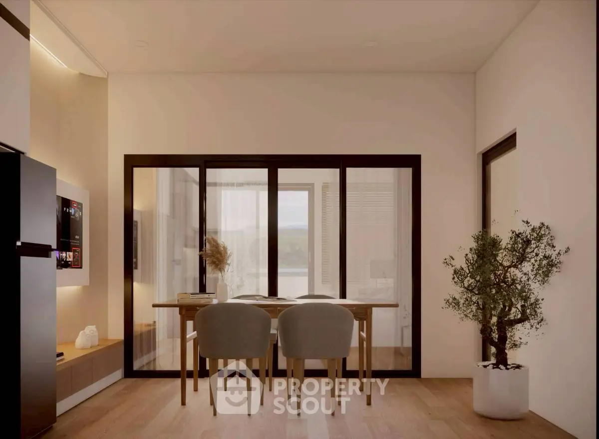 Modern dining area with glass doors and stylish decor