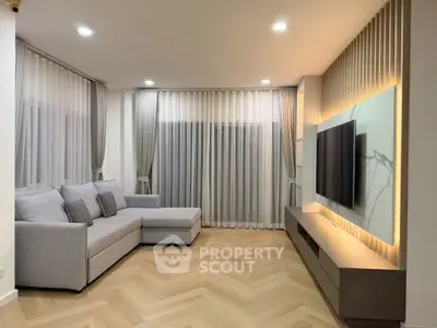 Modern living room with elegant decor and large sectional sofa