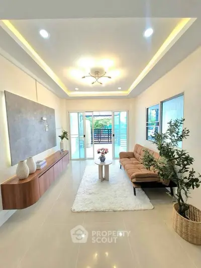 Spacious modern living room with elegant decor and natural light