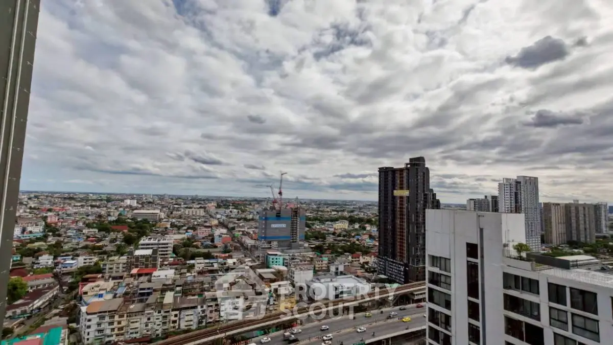 Stunning cityscape view from high-rise building with expansive skyline and urban landscape.