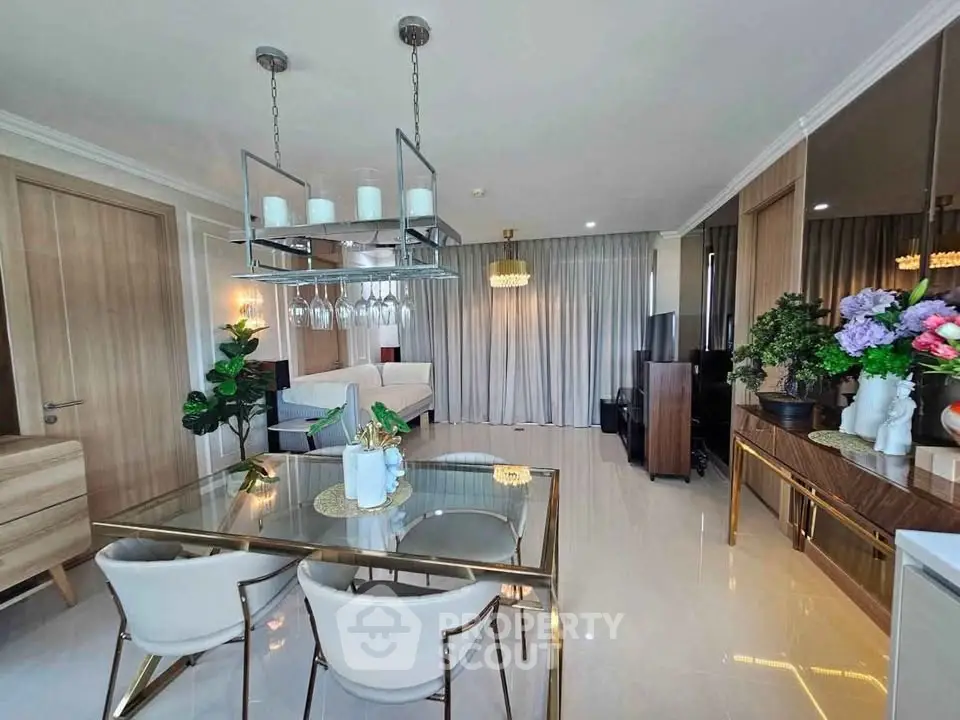 Luxurious open-plan living room with elegant dining area and modern decor