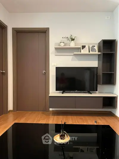 Modern living room with sleek TV unit and stylish decor