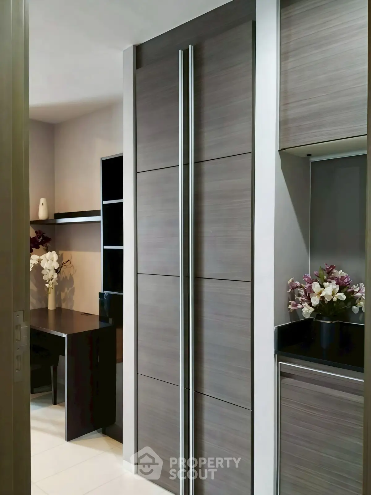 Modern study area with sleek cabinetry and elegant decor in a contemporary home.