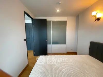 Modern bedroom with sleek design and ample natural light