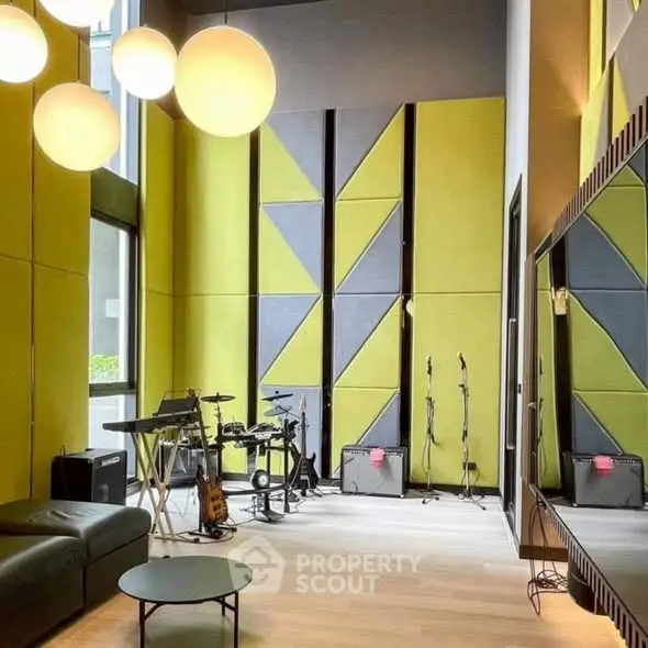 Modern music studio with high ceilings and stylish acoustic panels