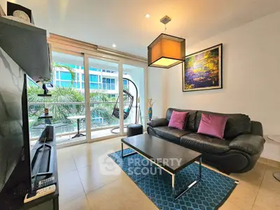 Modern living room with balcony view, stylish furniture, and natural light in urban apartment.