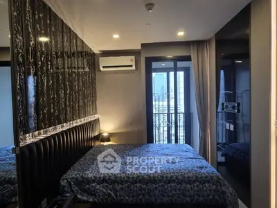 Modern bedroom with stylish decor and city view balcony in luxury apartment.