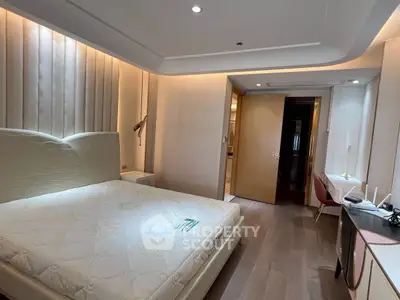 Luxurious bedroom with modern design and elegant lighting