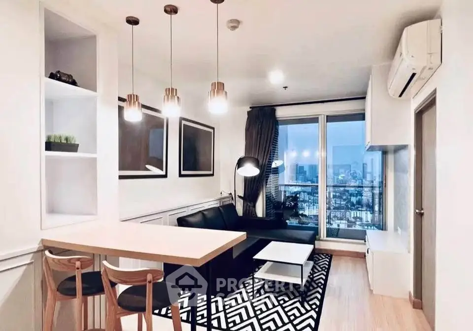 Modern living room with city view, stylish lighting, and cozy seating area.