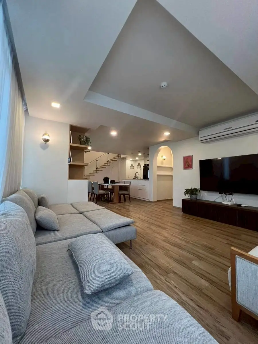 Spacious modern living room with stylish decor and open layout
