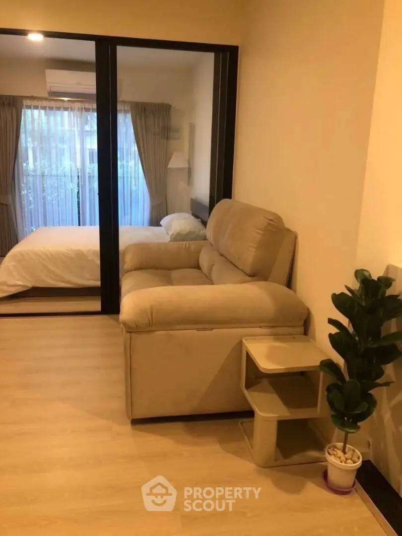 Cozy studio apartment with modern furnishings and natural light