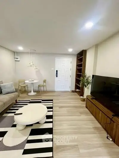 Modern living room with stylish decor and cozy seating area