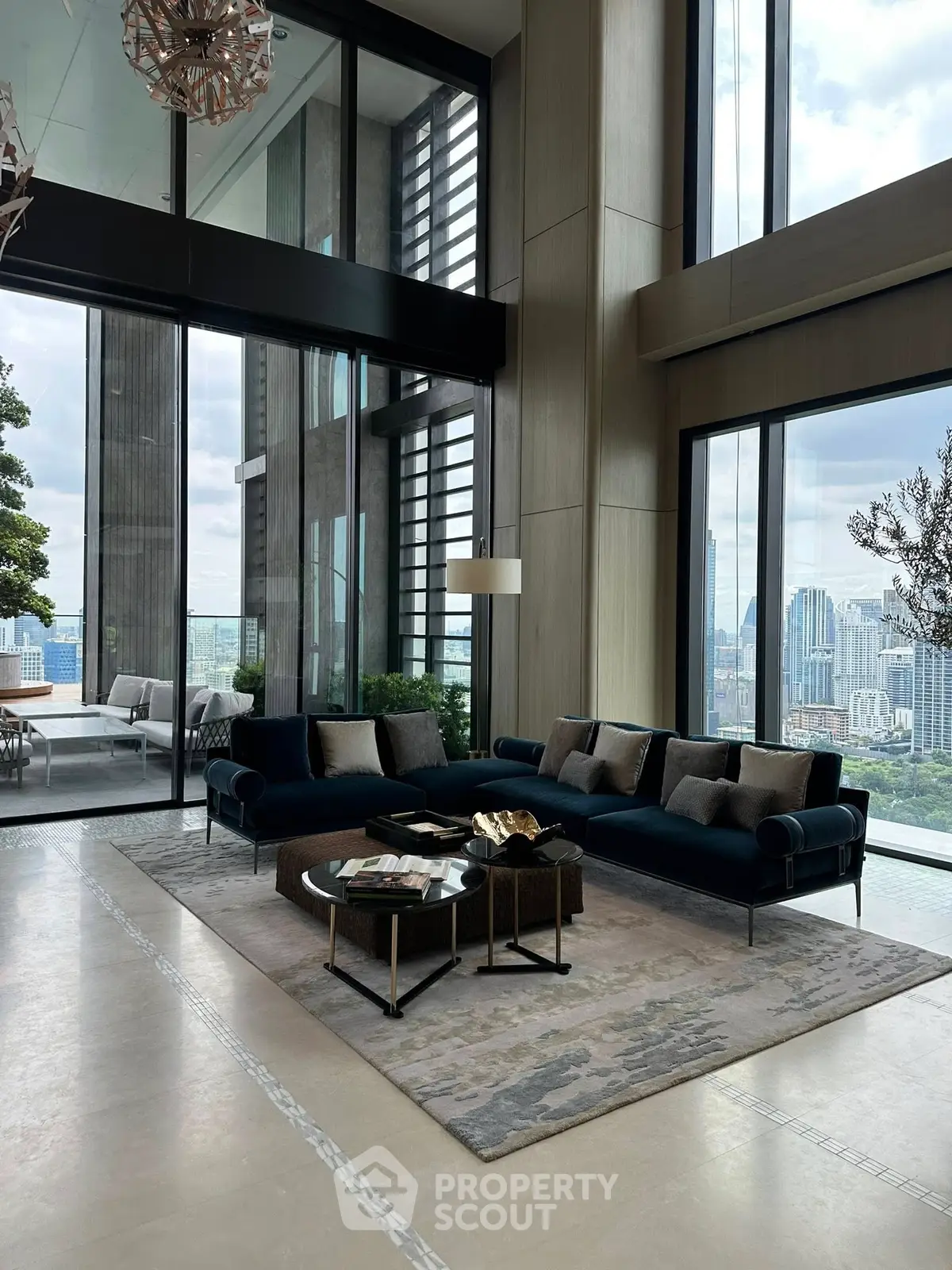 Luxurious high-rise living room with panoramic city views and elegant decor