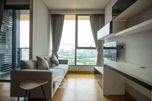 Modern living room with city view, sleek furniture, and large windows.