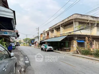 Explore potential in this urban street with commercial buildings, ideal for investment opportunities.
